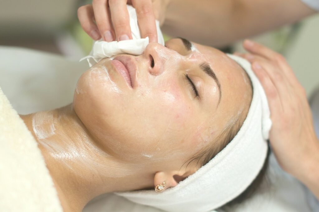 Facial cleansing at skin care spa